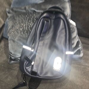 Coach Men’s backpack- navy blue with silver/gray reflective trim